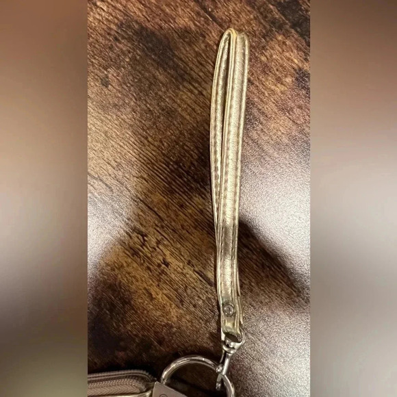 Chateau | ladies metallic gold wristlet. - Picture 4 of 9